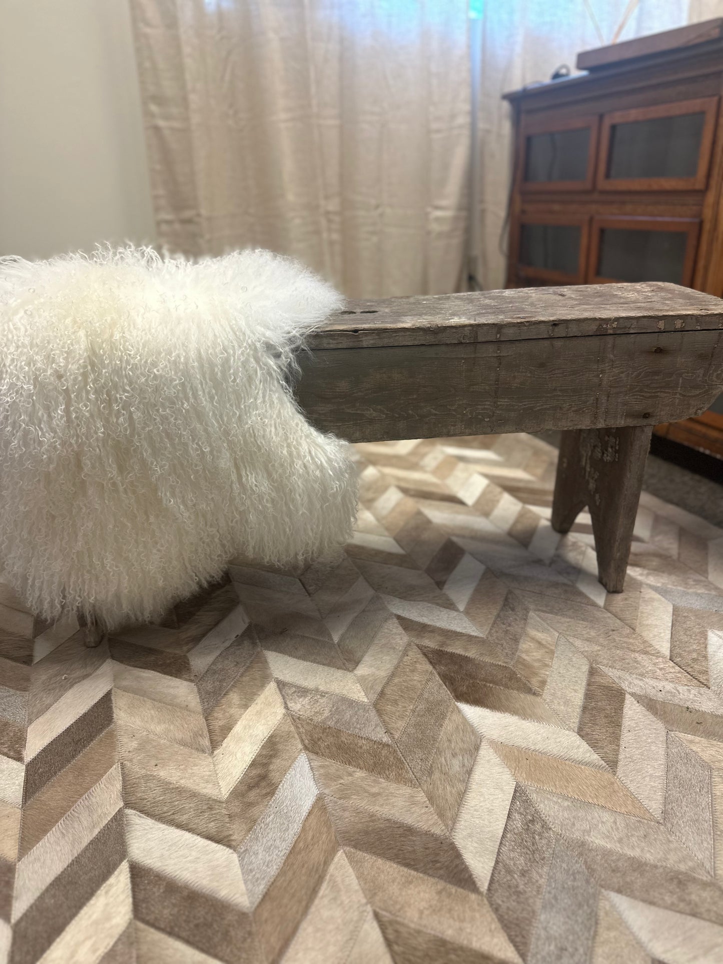 Found primitive bench with handle carved in middle