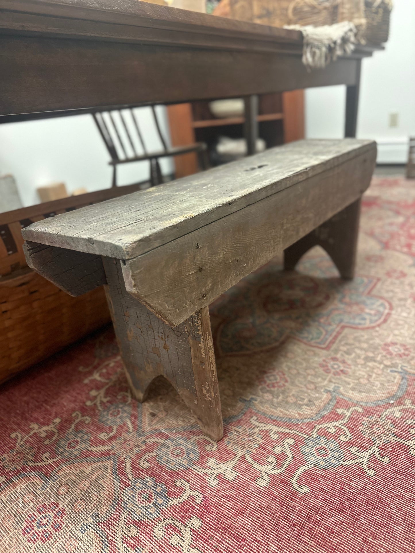 Found primitive bench with handle carved in middle