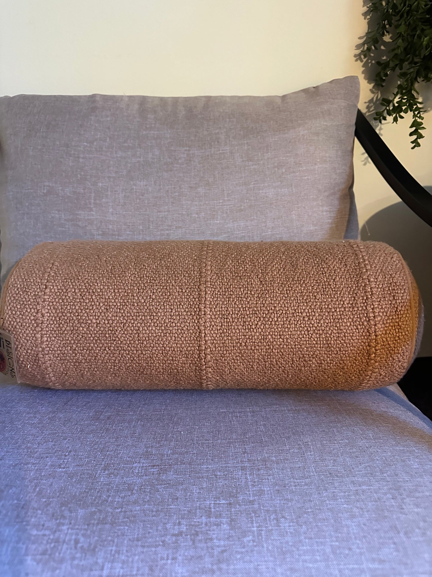 Rust round lumbar pillow